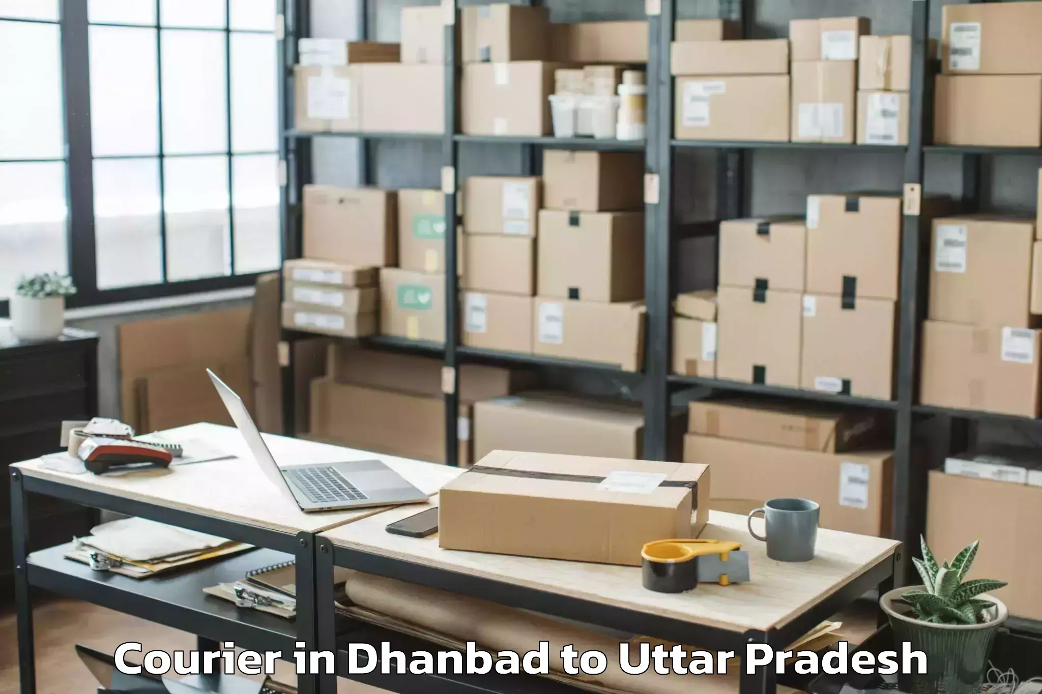 Efficient Dhanbad to Js University Shikohabad Courier